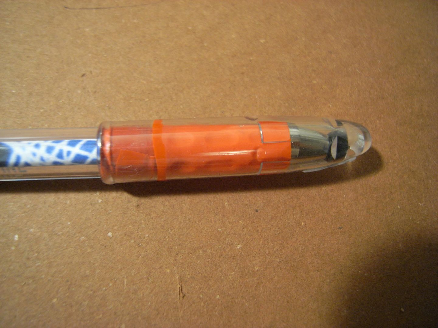 Back plug, insert, and reversed ink tube