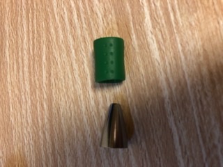 Close-up of a cap and tip component.