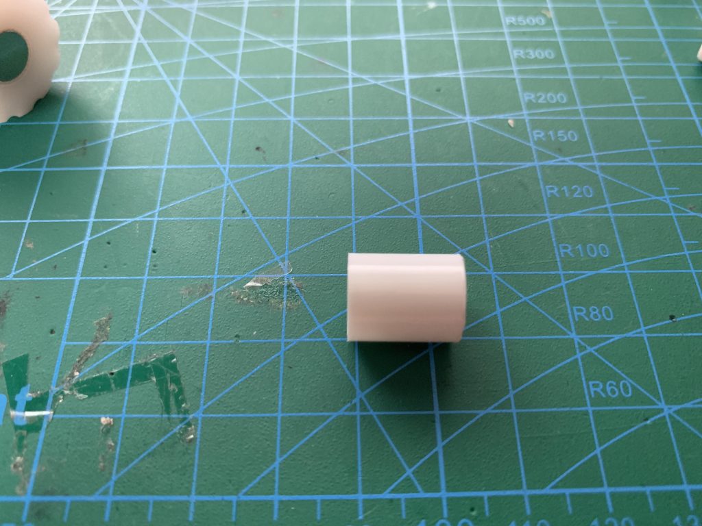 Emboss small cap cut to length.