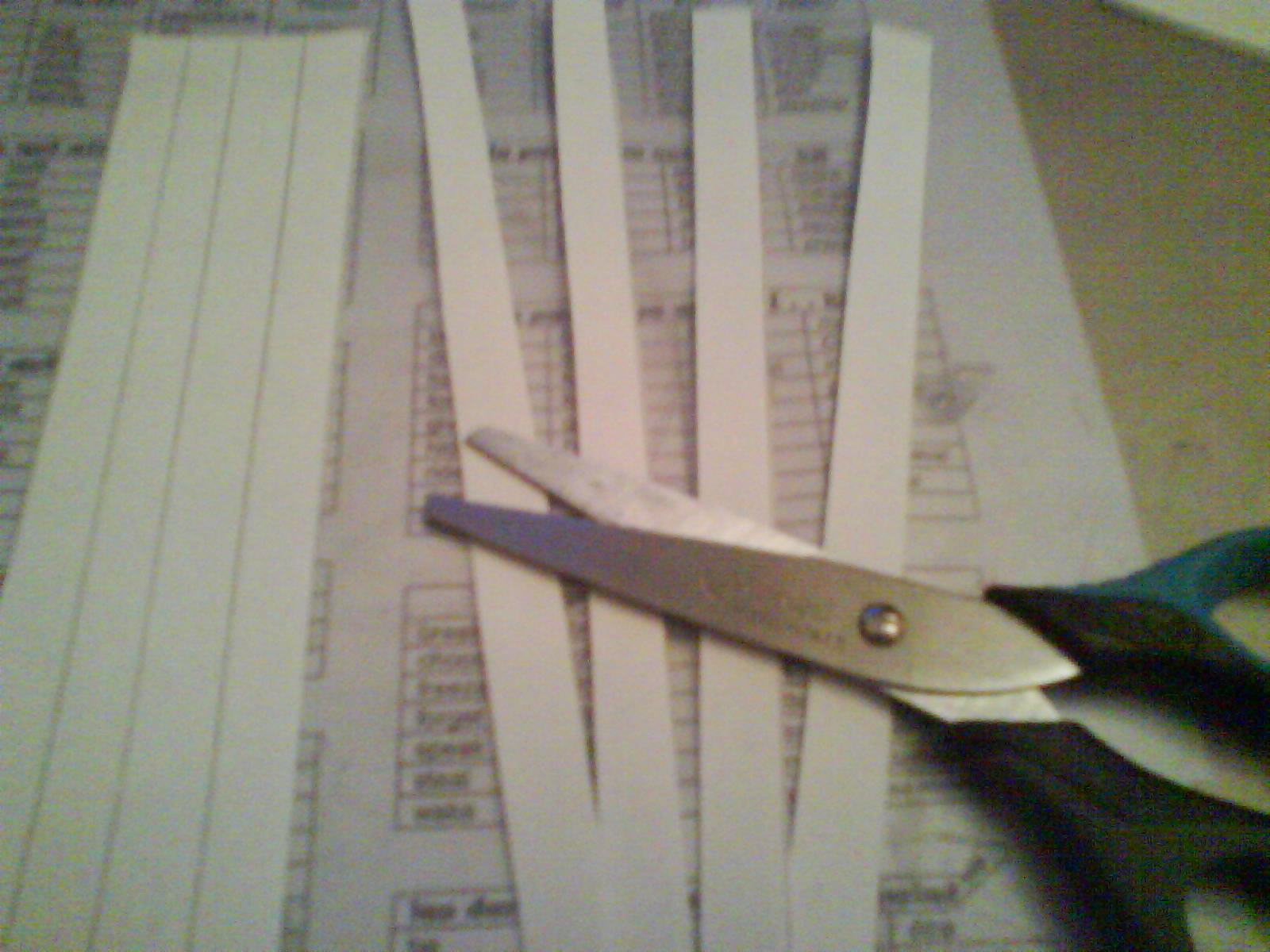 Paper-pipe pieces cut to shape.