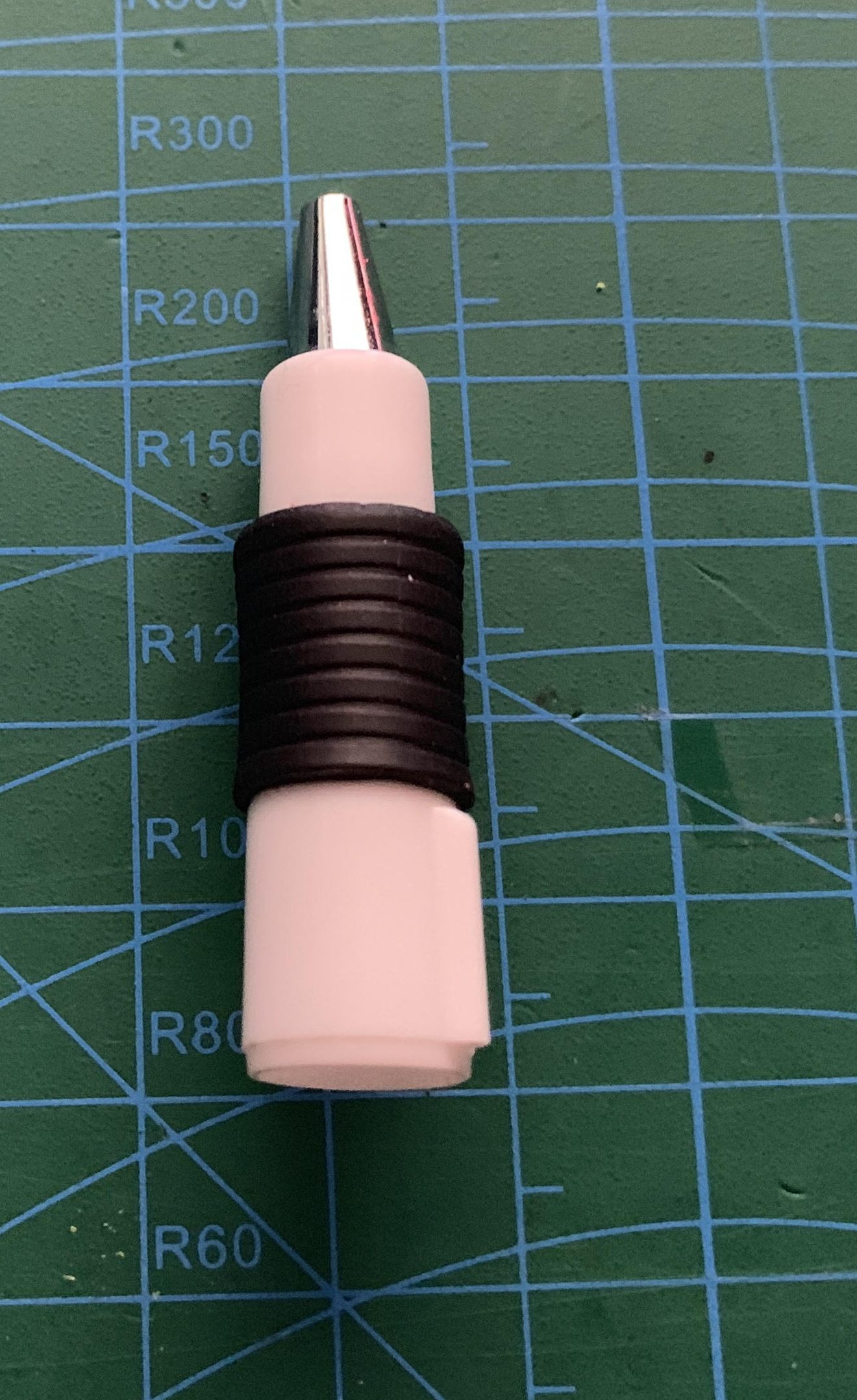Super Grip section fitted over the cap